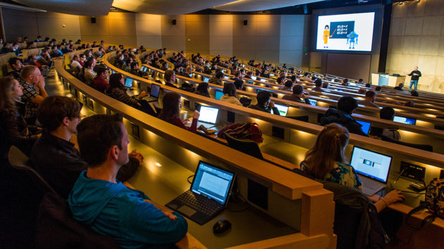 Professionals attending an AI training class